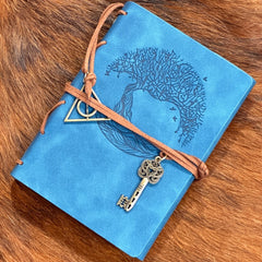 Timeless Elegance: Vegan Leather Bound Journal with Refillable Binding and Tree of Life Embossing