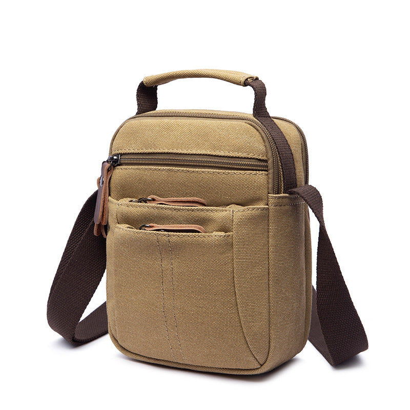 Travel-Size Crossbody Canvas Bag with Multiple Compartments: Organise On-the-Go